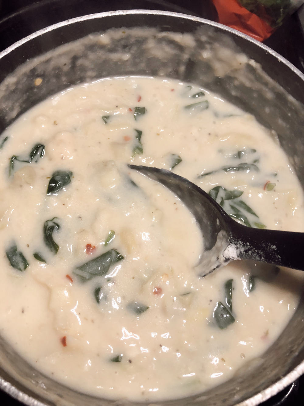 Step 4 for Creamy spinach artichoke pasta